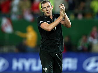 Richard Dunne swaps boots for...
